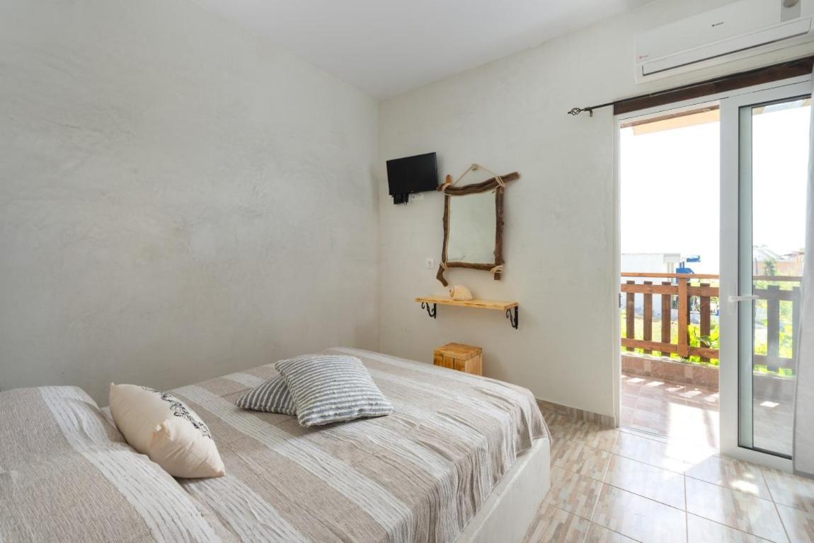 Christos Studios And Family Apartments Stegna ภายนอก รูปภาพ